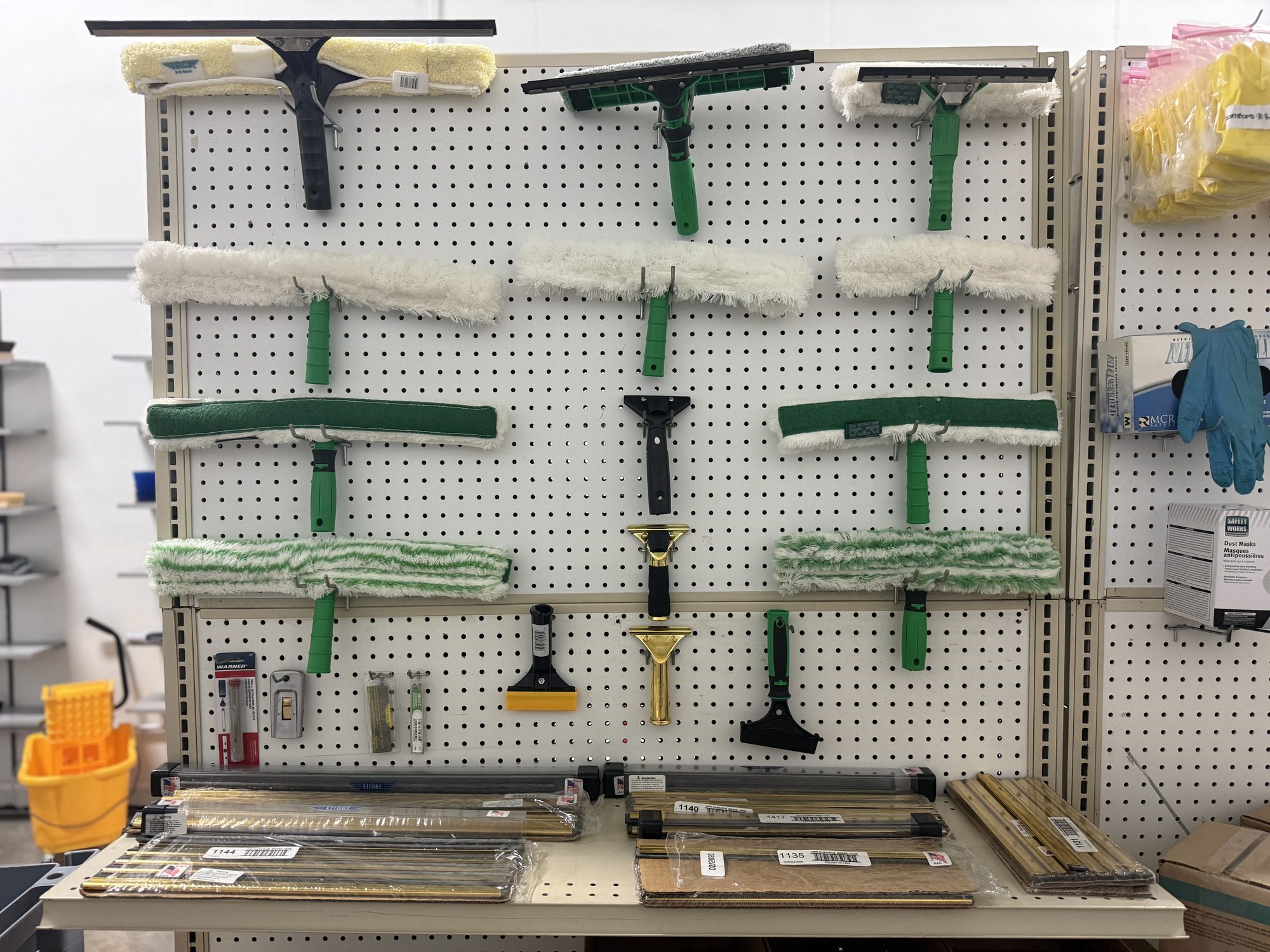 Squeegees and window cleaning tools on display